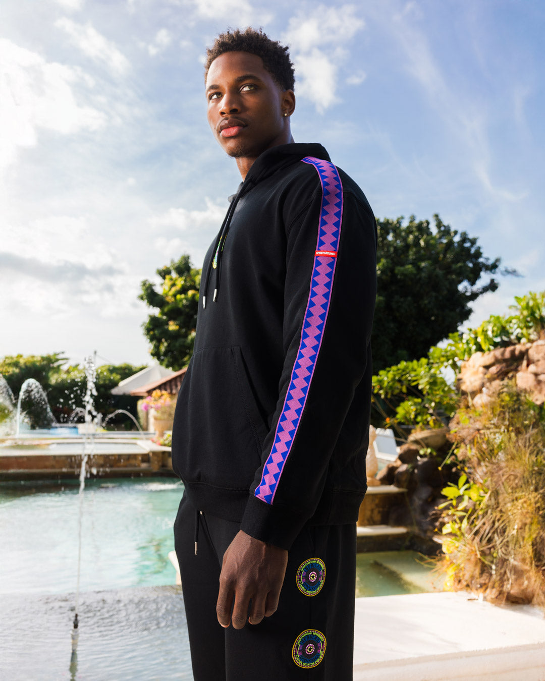 Side view of the joggers, demonstrating the comfort and flexibility of the 100% cotton material.