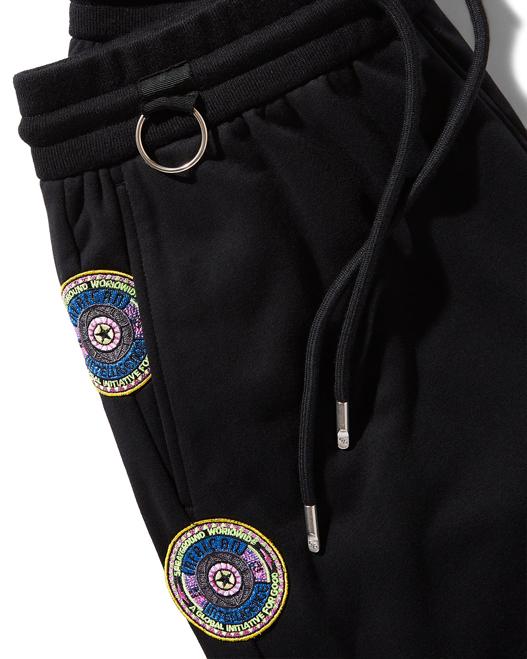 Front view of Sandflower Collab Joggers in sandflower color, showcasing the elastic waistband and front pockets.