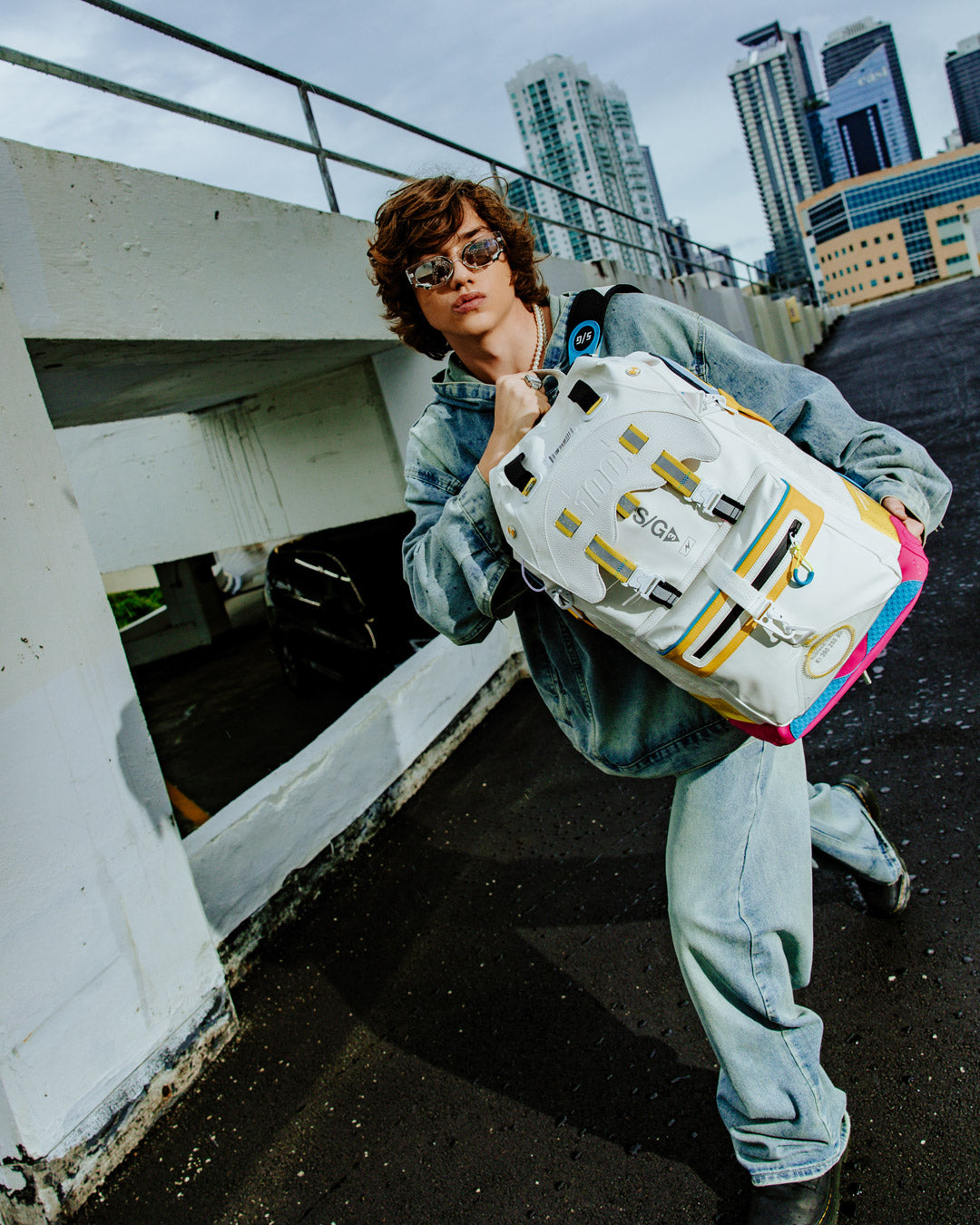 Front view of the durable travel backpack with magnetic snap closures