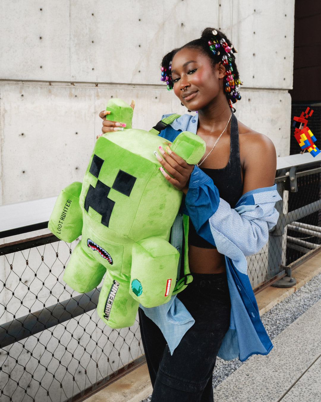 Front view of Minecraft MoneyBear backpack with Creeper face and adjustable straps