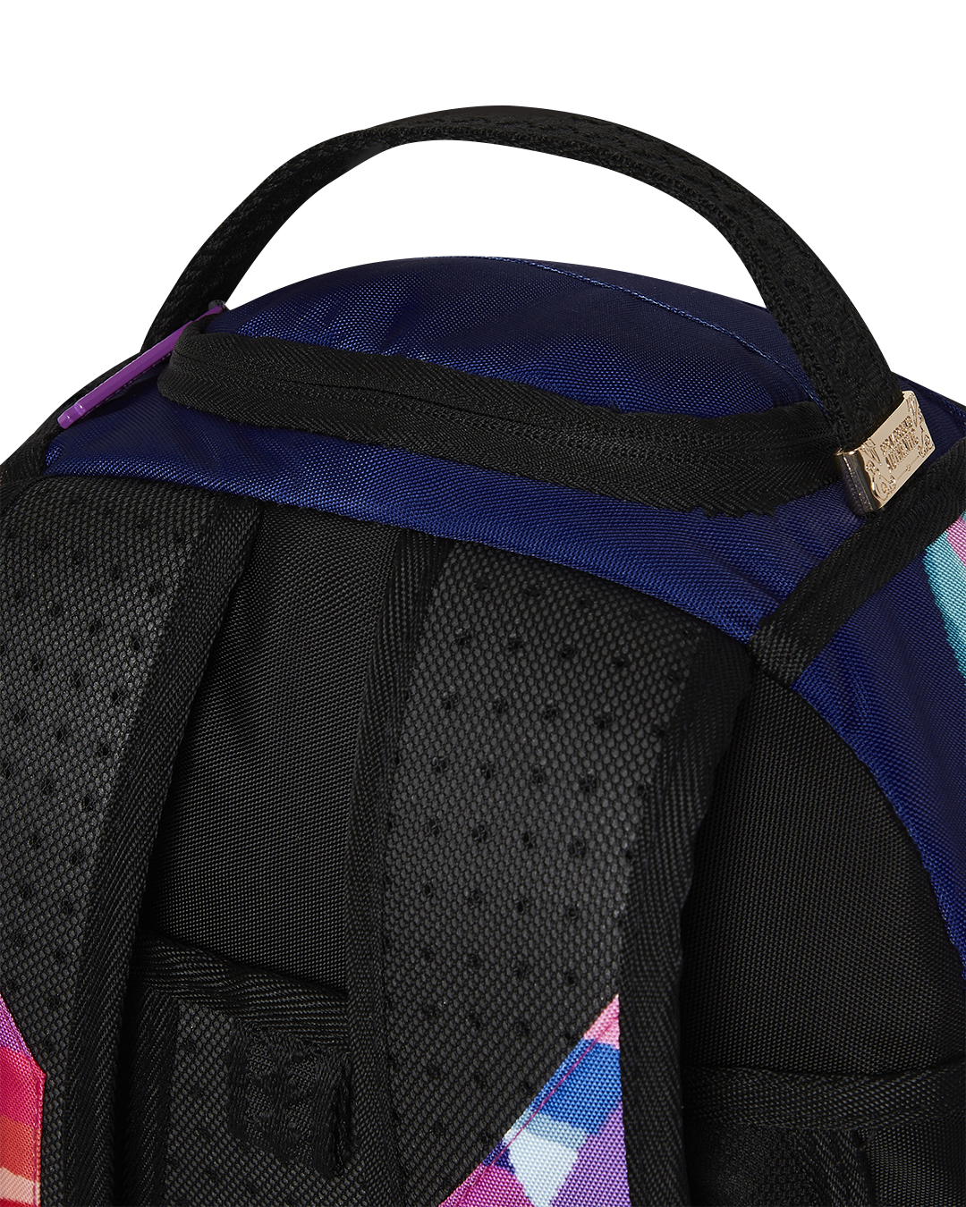 Interior view of the Astro Crew backpack highlighting the velour laptop compartment and mesh organizer.