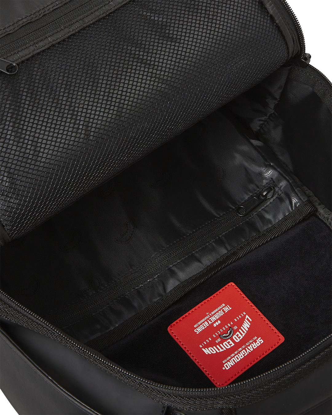 Timbuk2 Authority Deluxe Faux Leather Backpack - side view showing adjustable straps