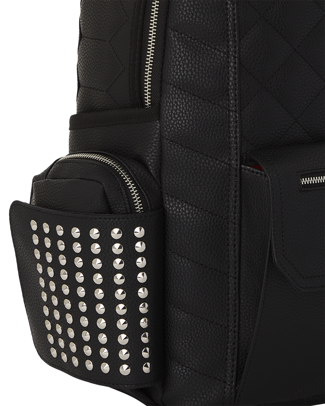 Side view of backpack open to reveal laptop compartment and organizational pockets