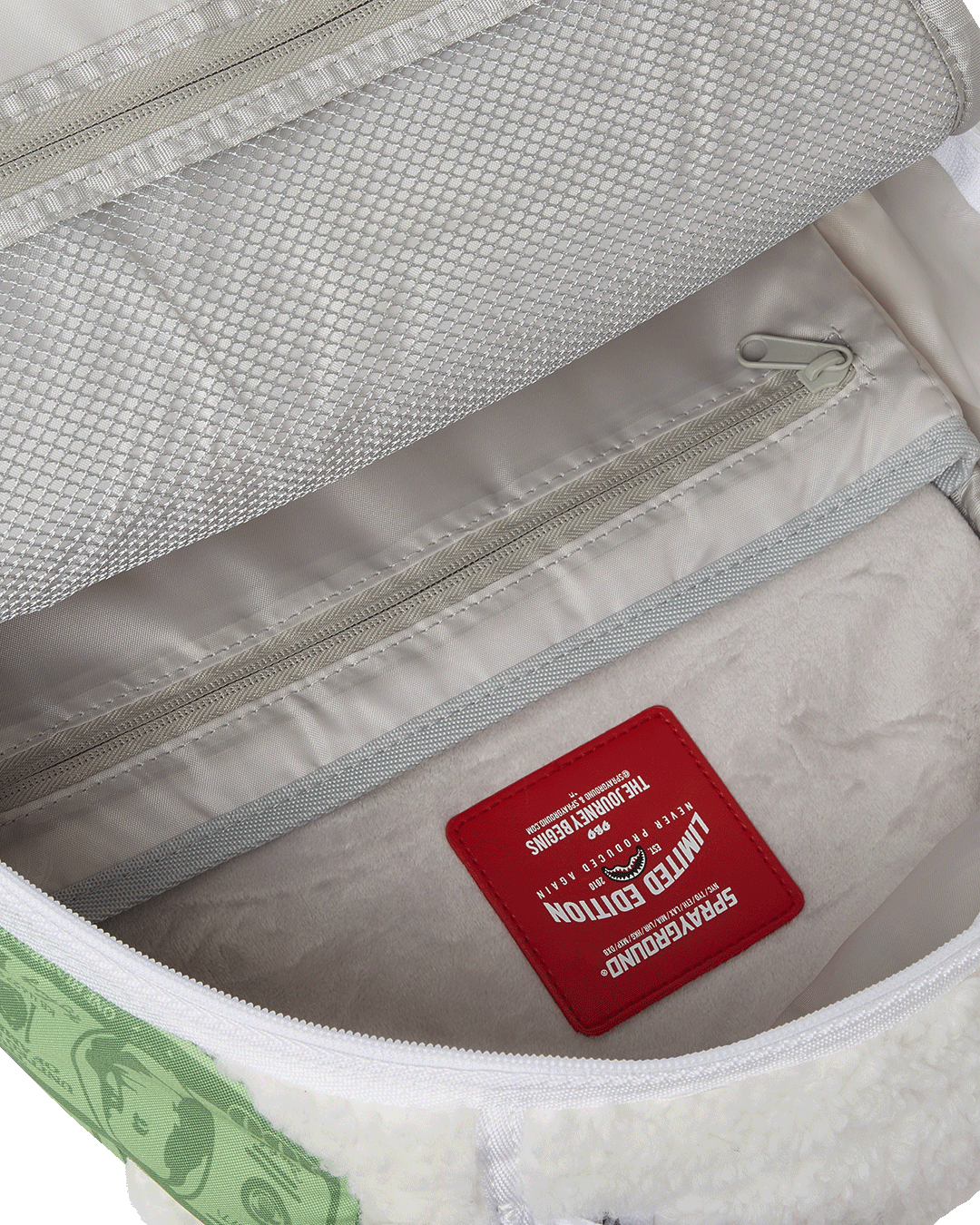 Side profile showing the spacious compartments and adjustable straps