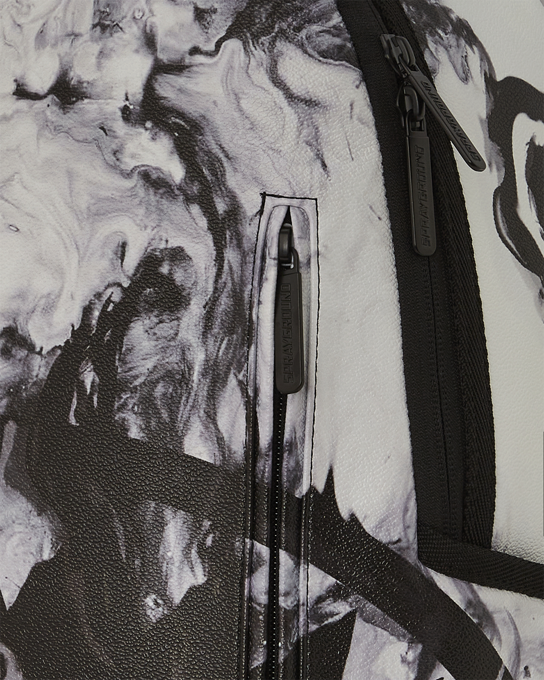 Front view of marble faux leather backpack with gold hardware and ergonomic straps