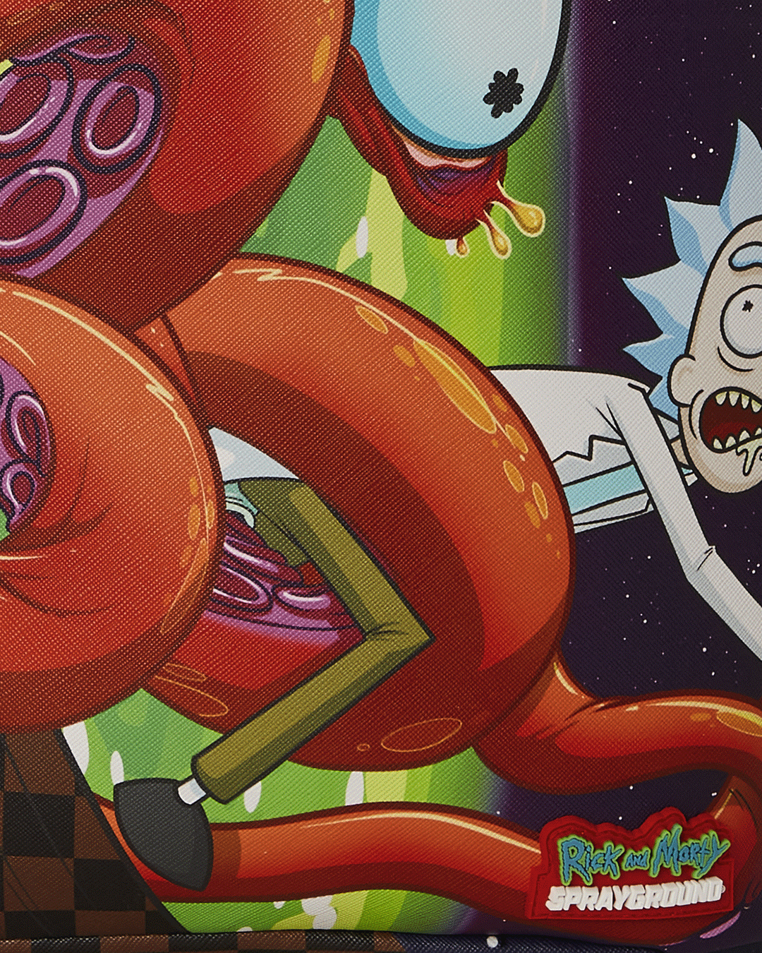 Sprayground backpack Rick and Morty version with open compartments showing laptop and sunglasses