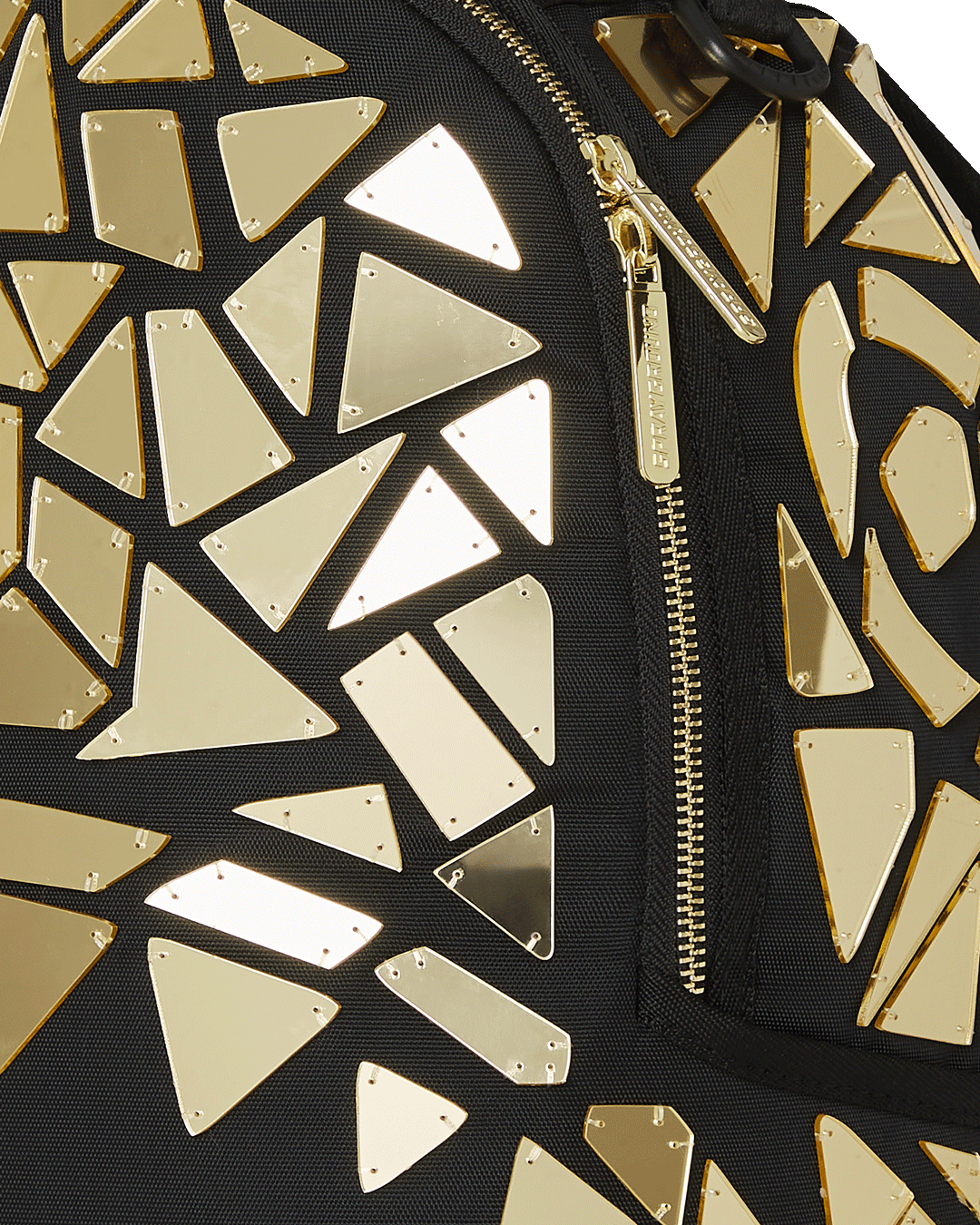 Front view of handmade mirror shark burst backpack highlighting gold acrylic tile detail