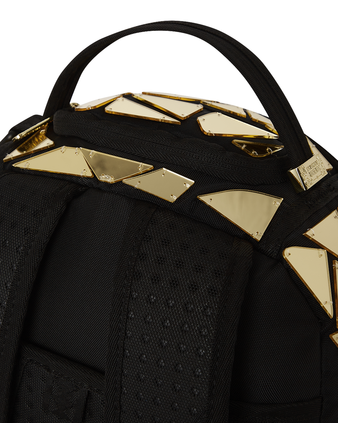 Interior of the backpack with velour laptop compartment and mesh organizer