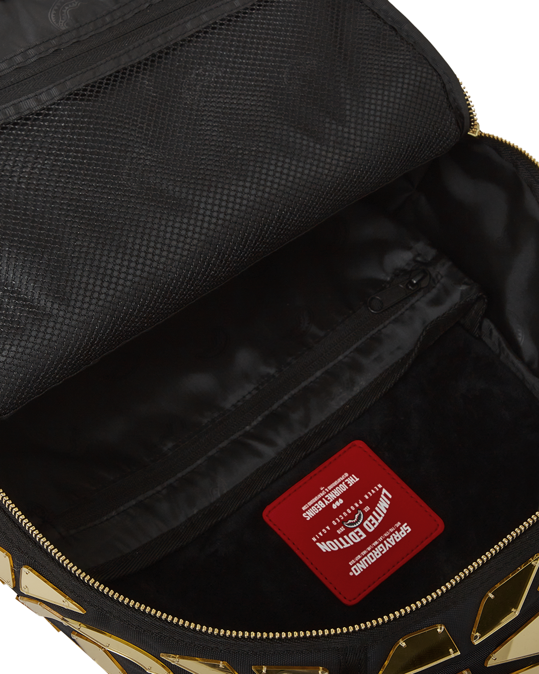 Side angle showing water-resistant faux leather and metal hardware
