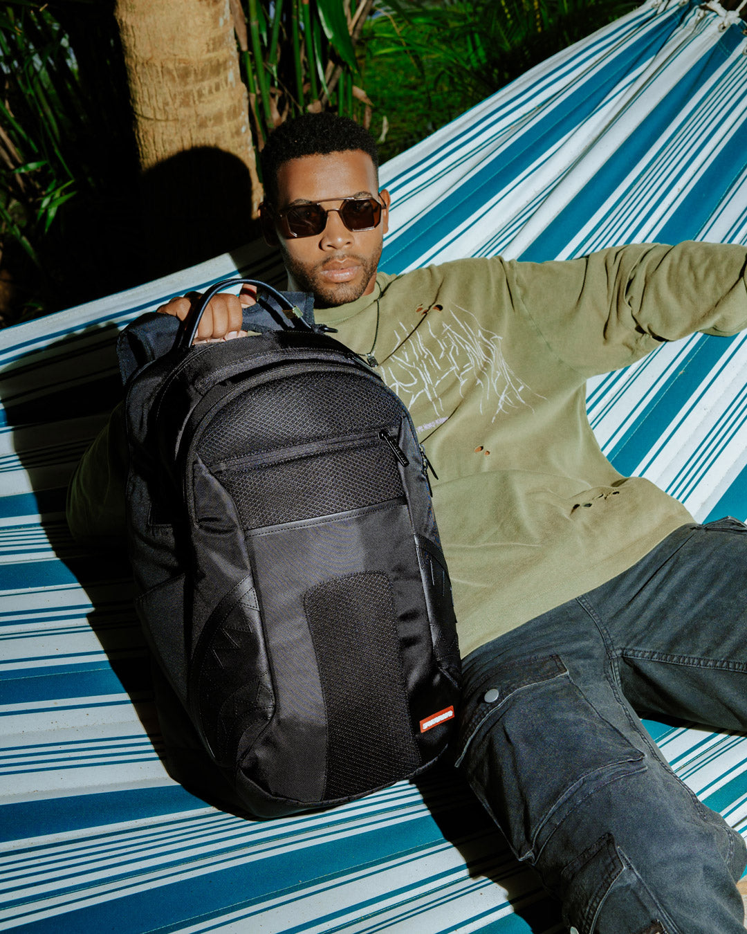 Back view of the Nomad Basecamp backpack with adjustable straps.