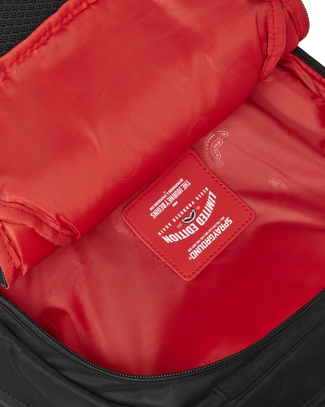 Side view of the Nomad Basecamp backpack, perfect for travel.