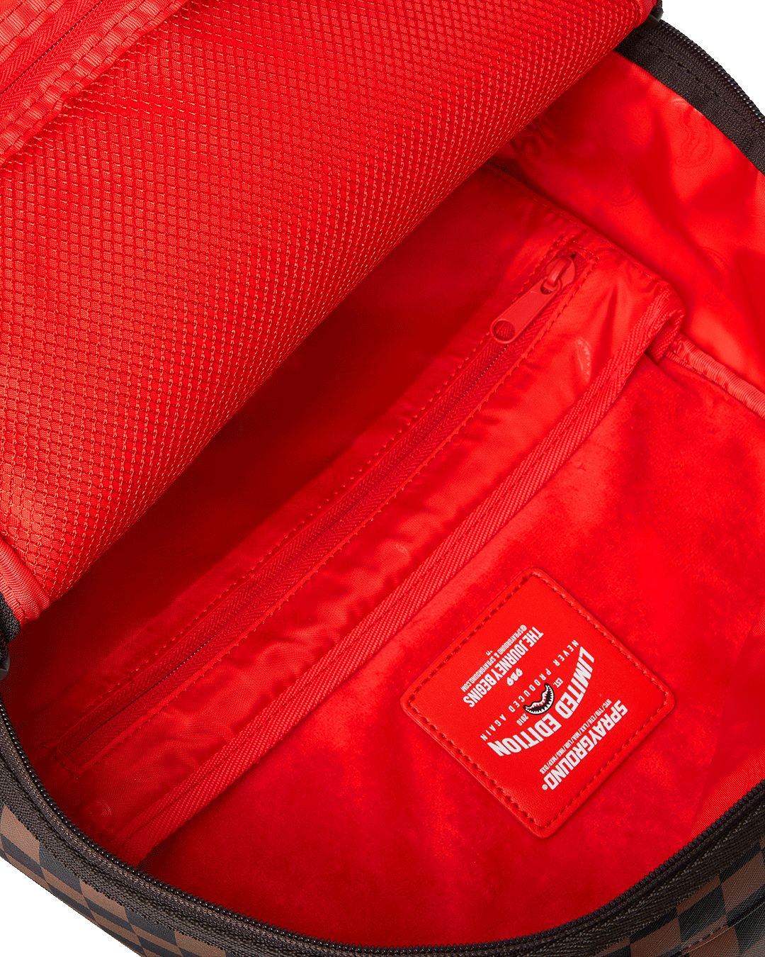 Ergonomic back panel of the leather laptop backpack showing mesh padding and adjustable straps