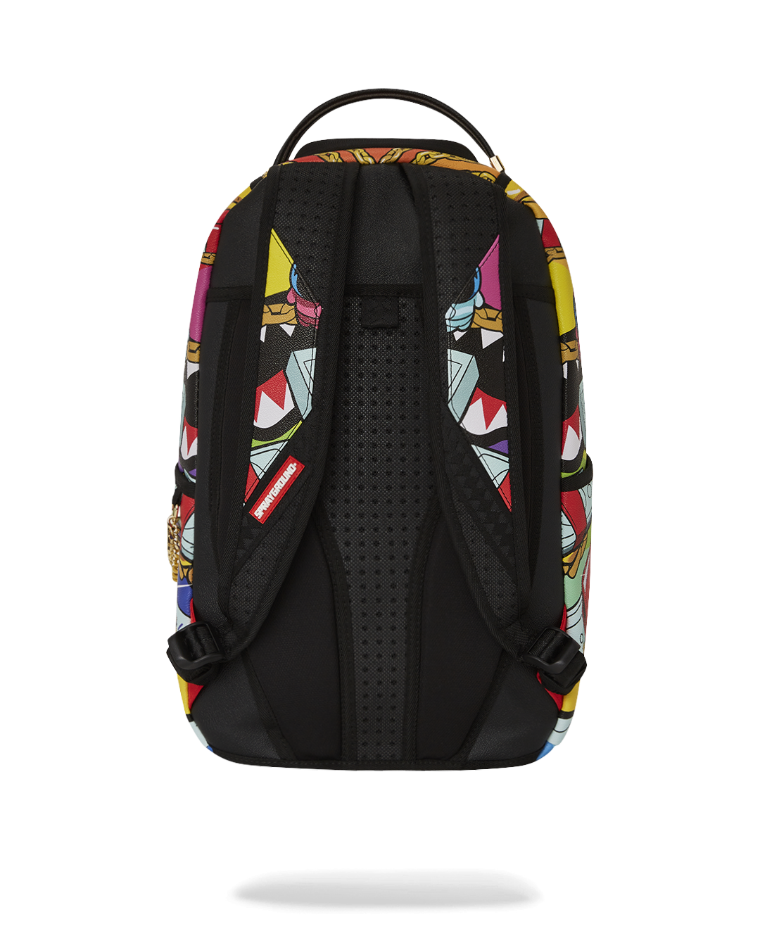 Soulja Drifter connected to carry-on luggage through sleeve