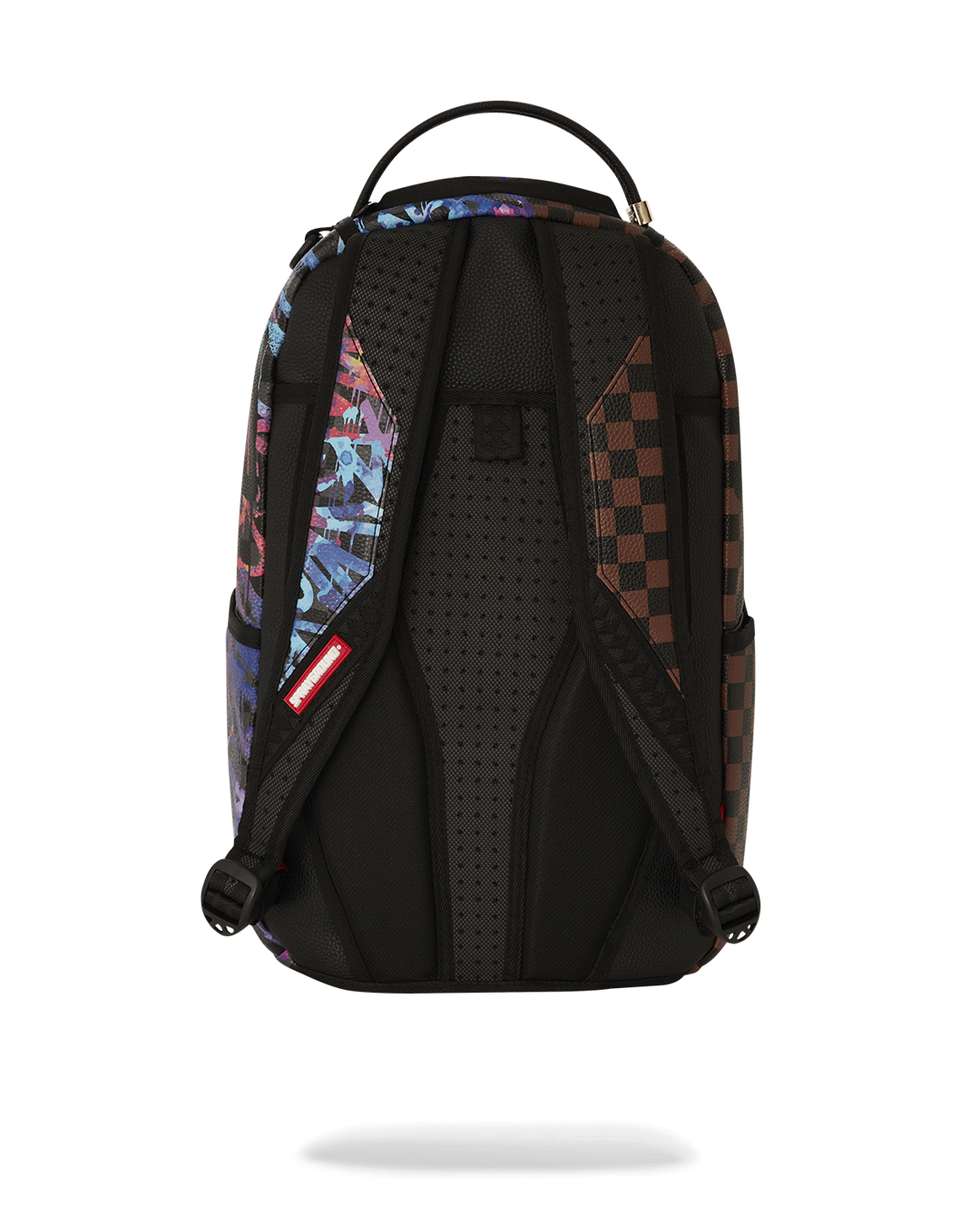 Detail shot of the faux leather material with glow-in-the-dark accents on the backpack