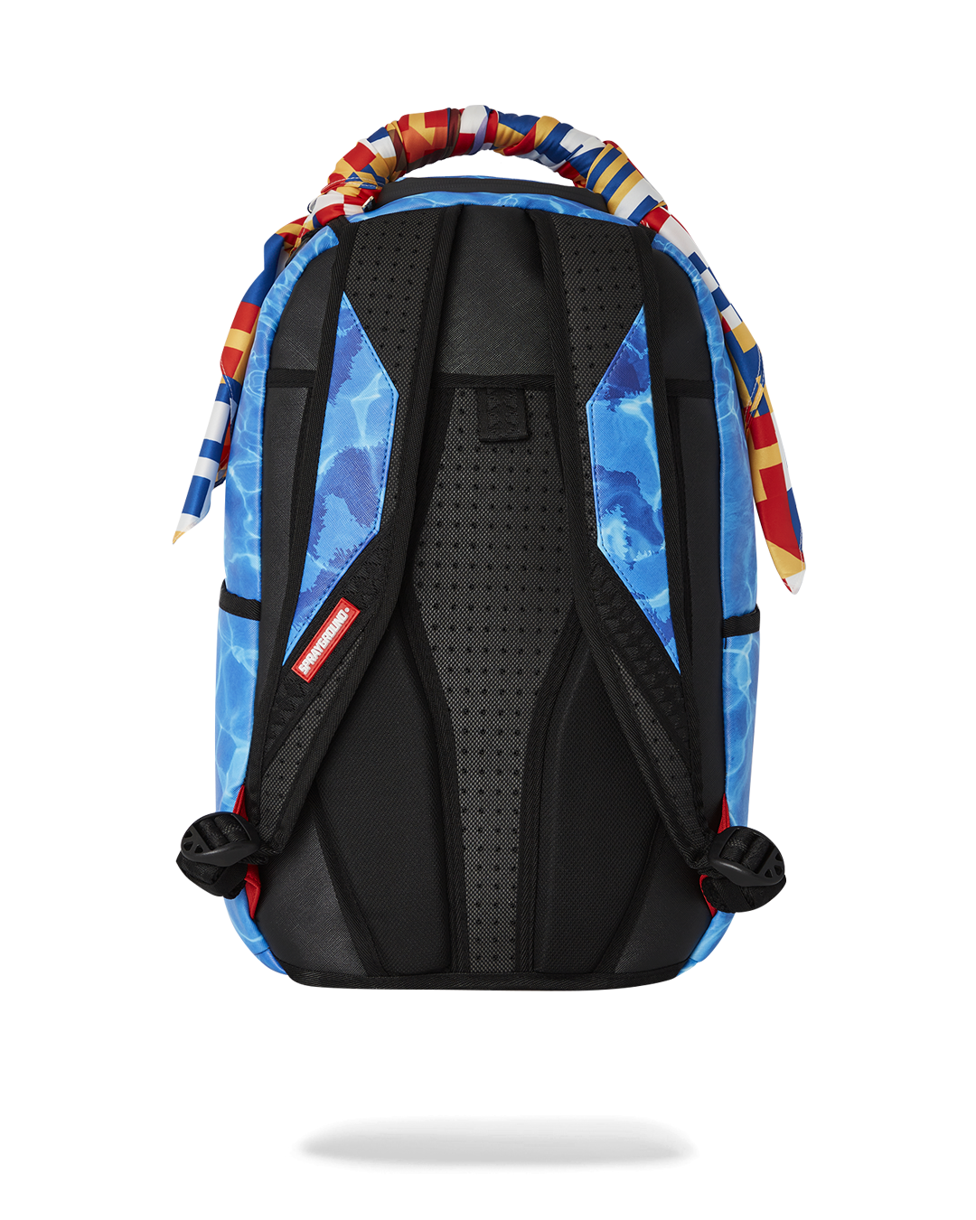 Nautica backpack worn over shoulder, showcasing removable scarf detail
