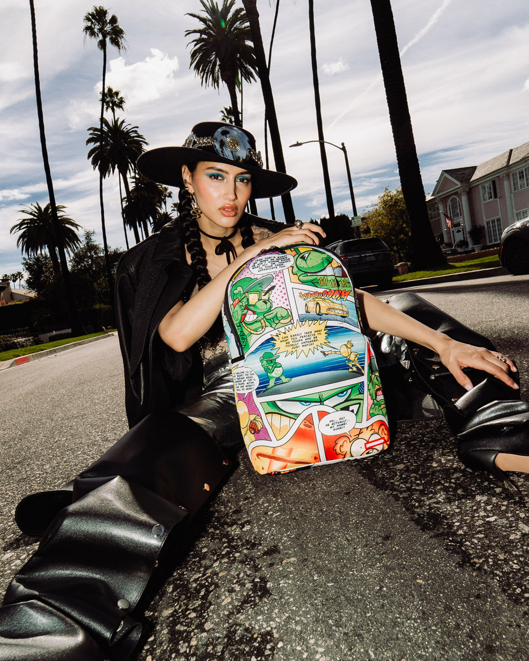Sprayground Ignition DLXSR Backpack in use, showcasing ergonomic mesh back