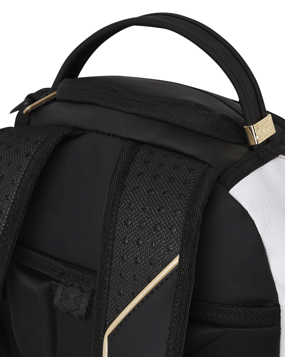 Close-up of the backpacks USB charging port and adjustable straps