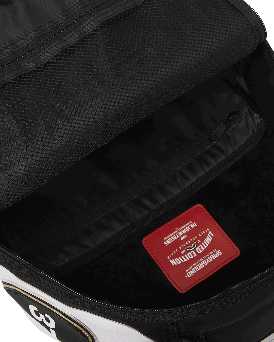 Interior showing velour laptop compartment and organizer pockets