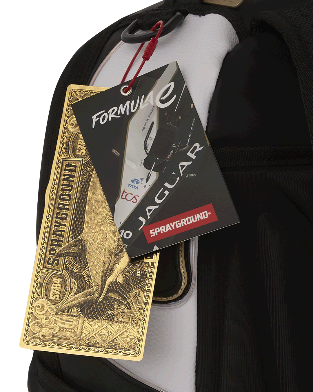 Jaguar Formula-E LED backpack glowing at night, worn over a leather jacket