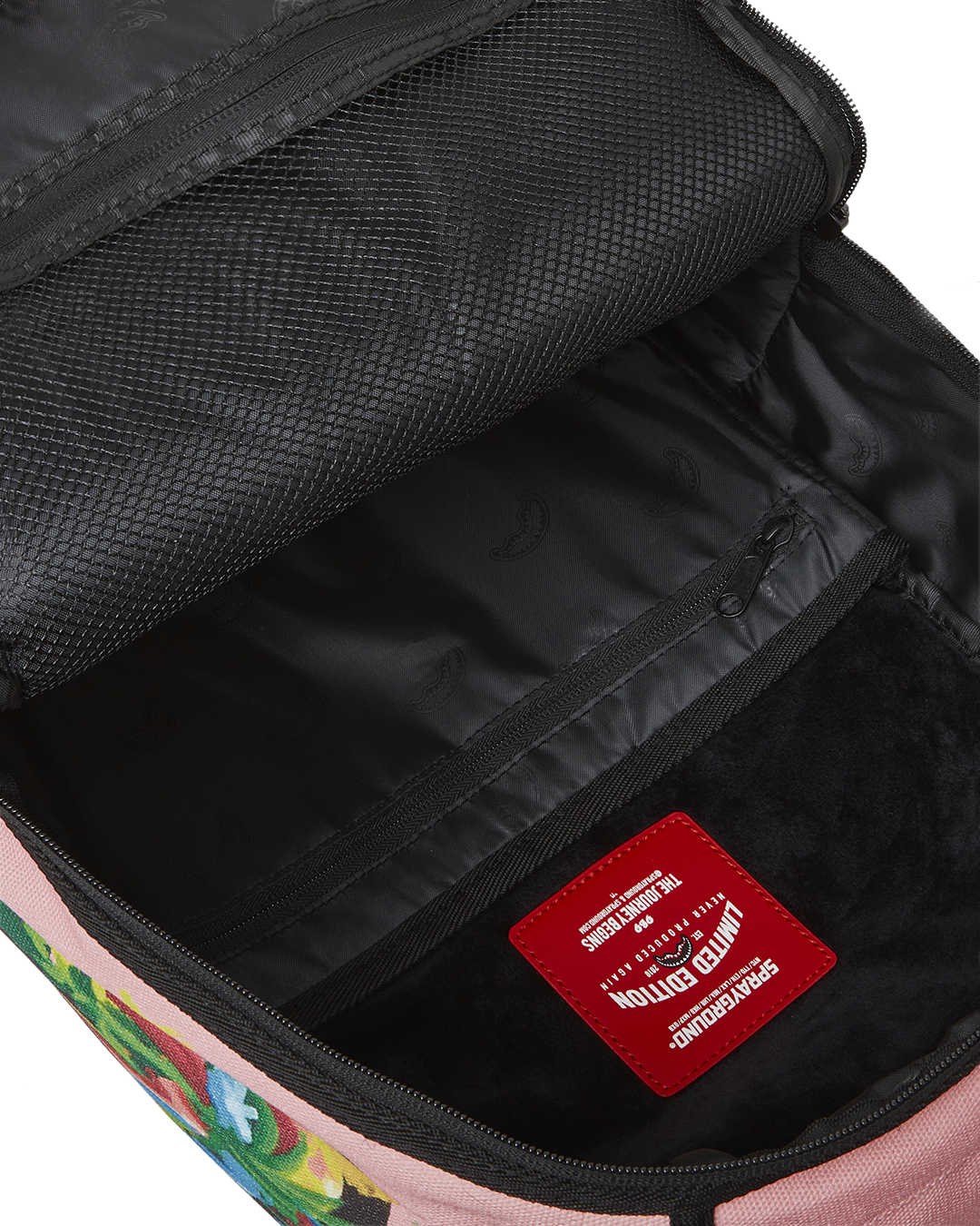 Side view highlighting the water-resistant exterior and side pockets