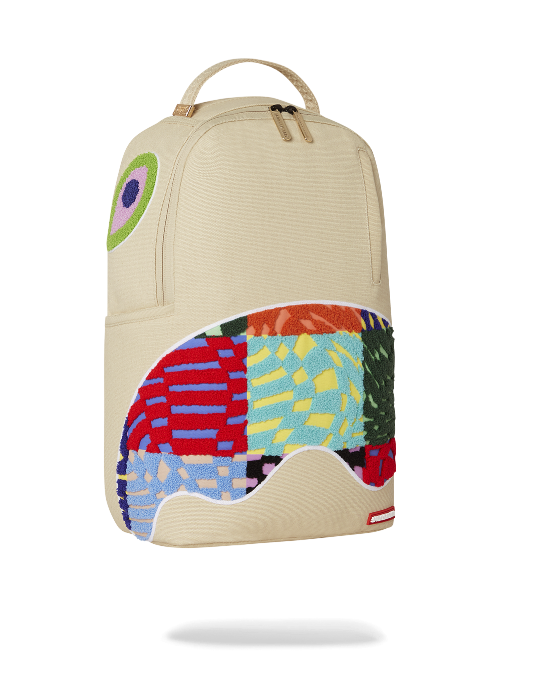 Side view of the backpack with side pockets and slide-through luggage sleeve.