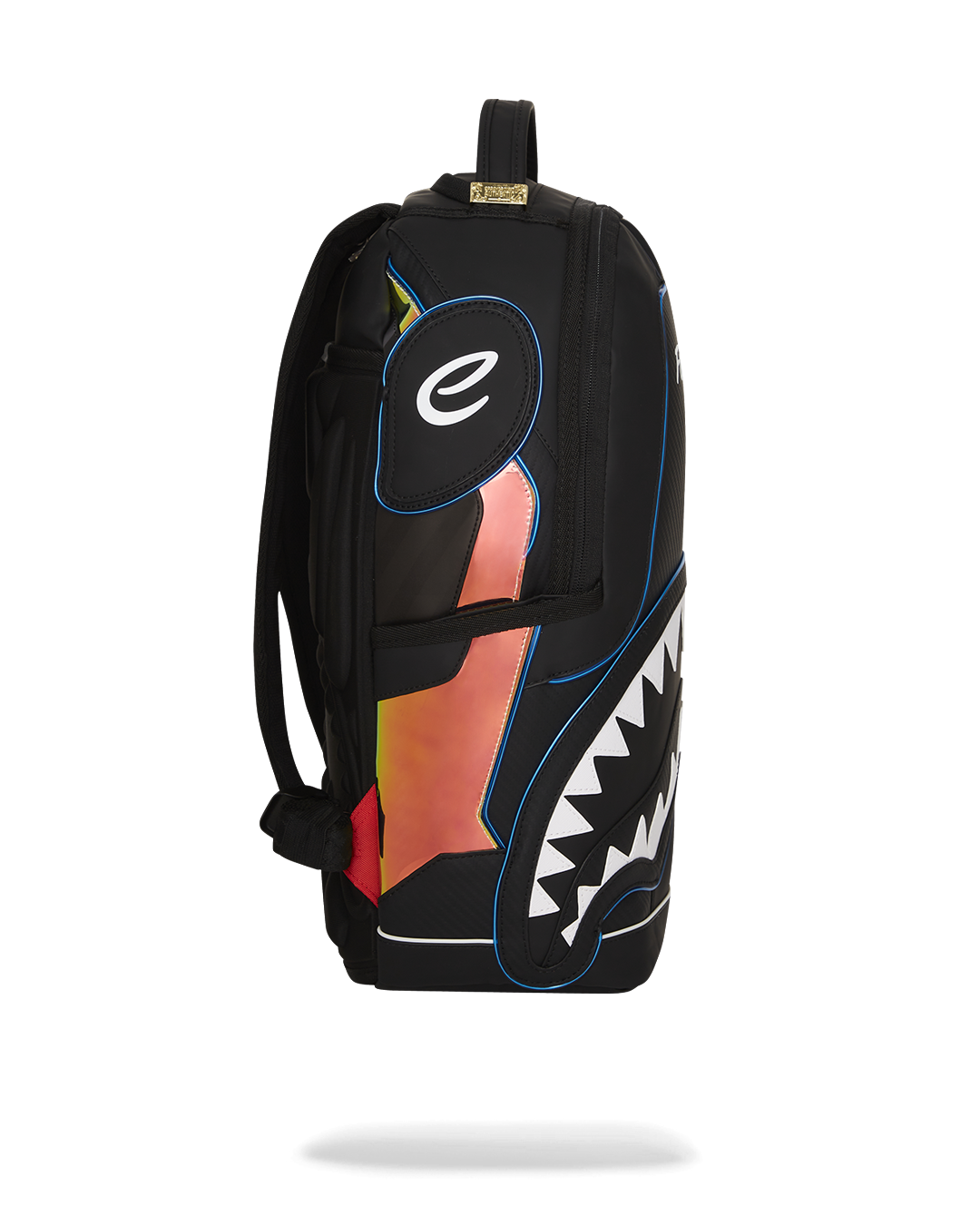 Close-up of the metallic fabric and gold zippers on the LED backpack.