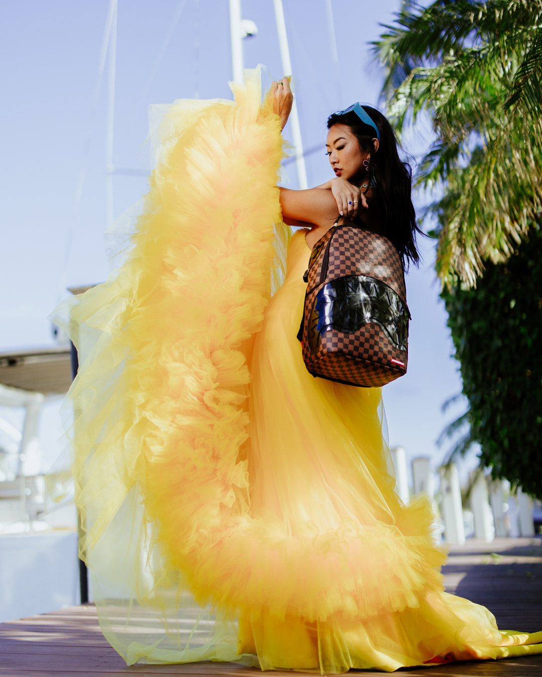 Faux leather backpack with gold zippers and ergonomic design