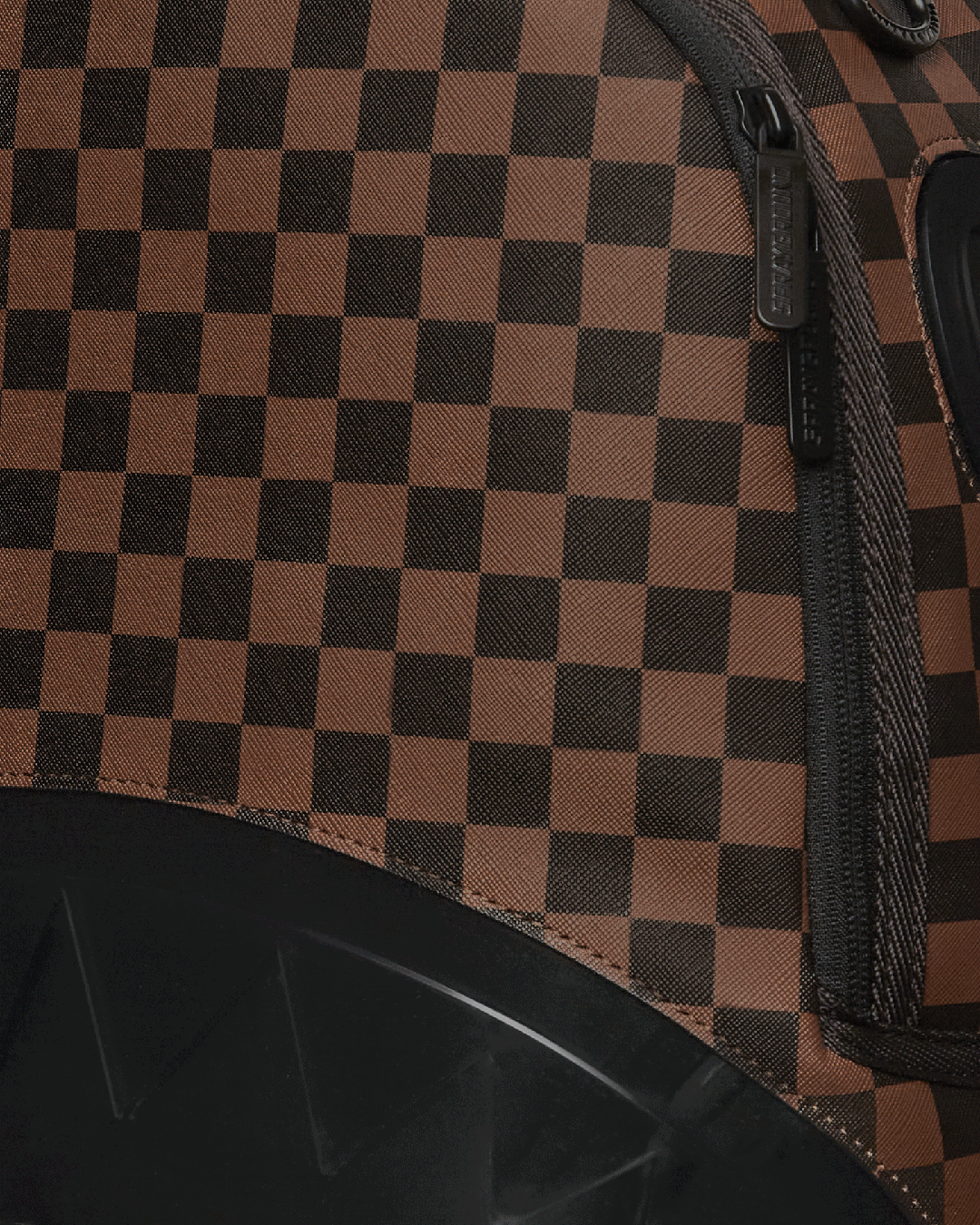 Faux leather backpack with gold zippers and ergonomic design