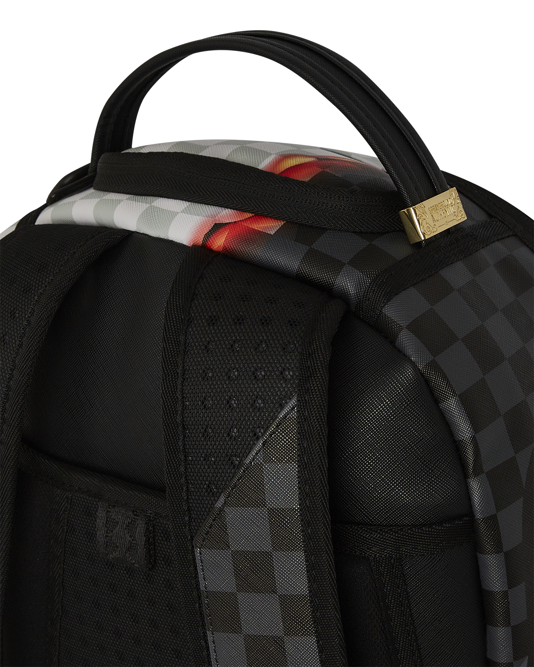 Close-up of faux leather backpack with gold zippers and mesh padding
