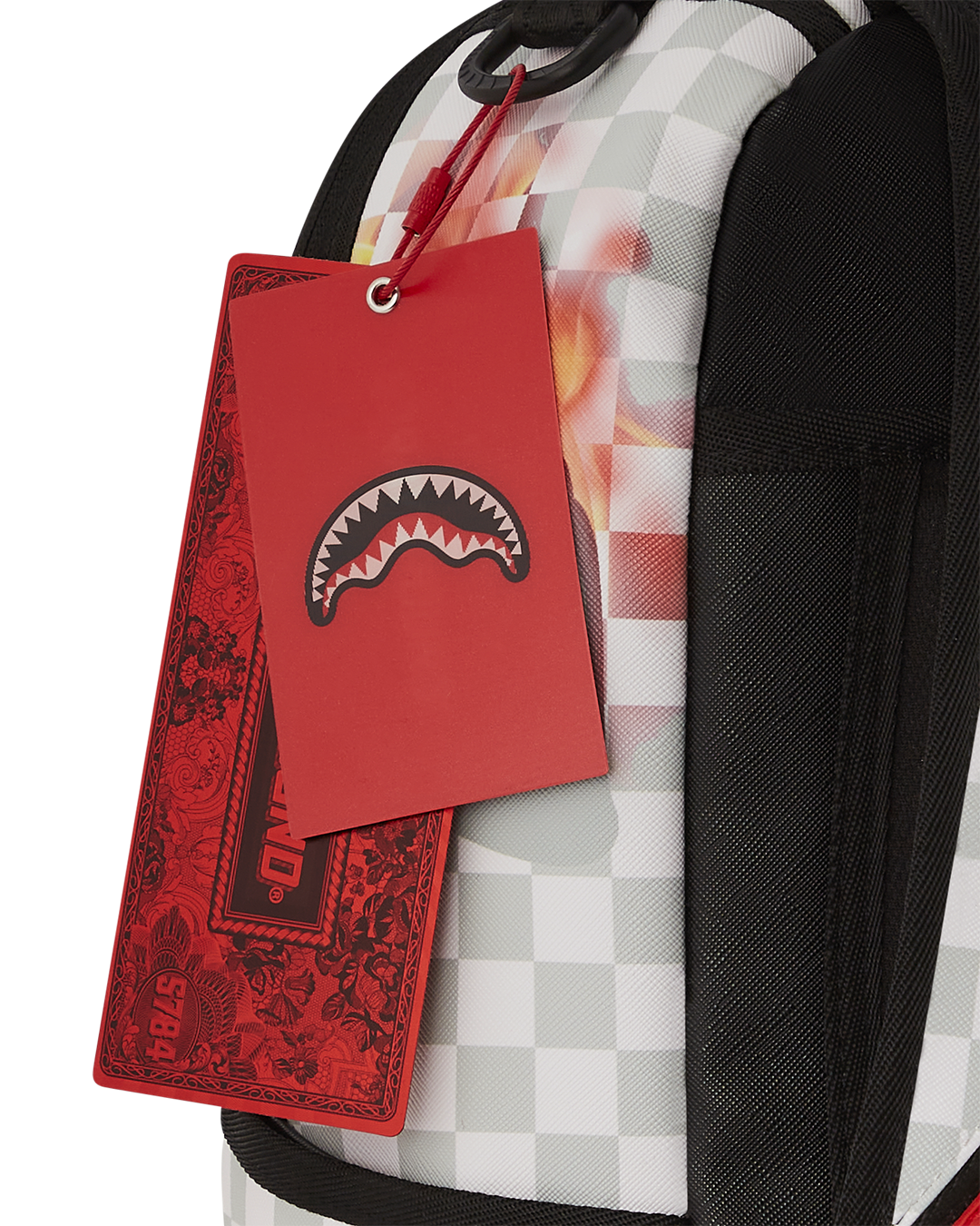 Travel backpack for women shown connected to carry-on suitcase at airport