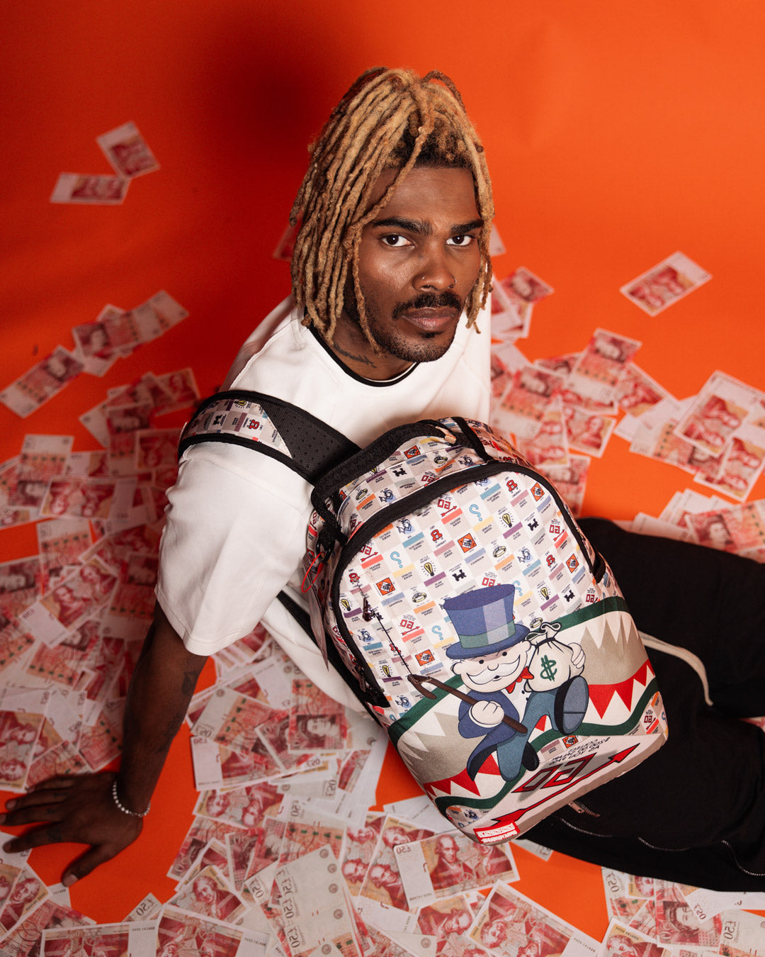 Close-up of Monopoly backpacks gold zippers and ergonomic back padding