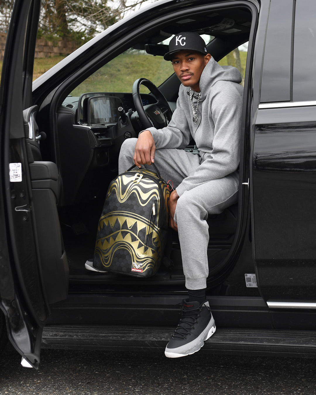 Honeycomb backpack worn by a designer in an urban setting