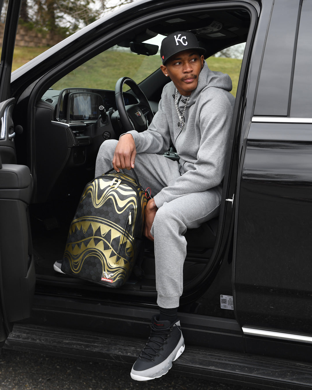 Honeycomb backpack worn by a designer in an urban setting