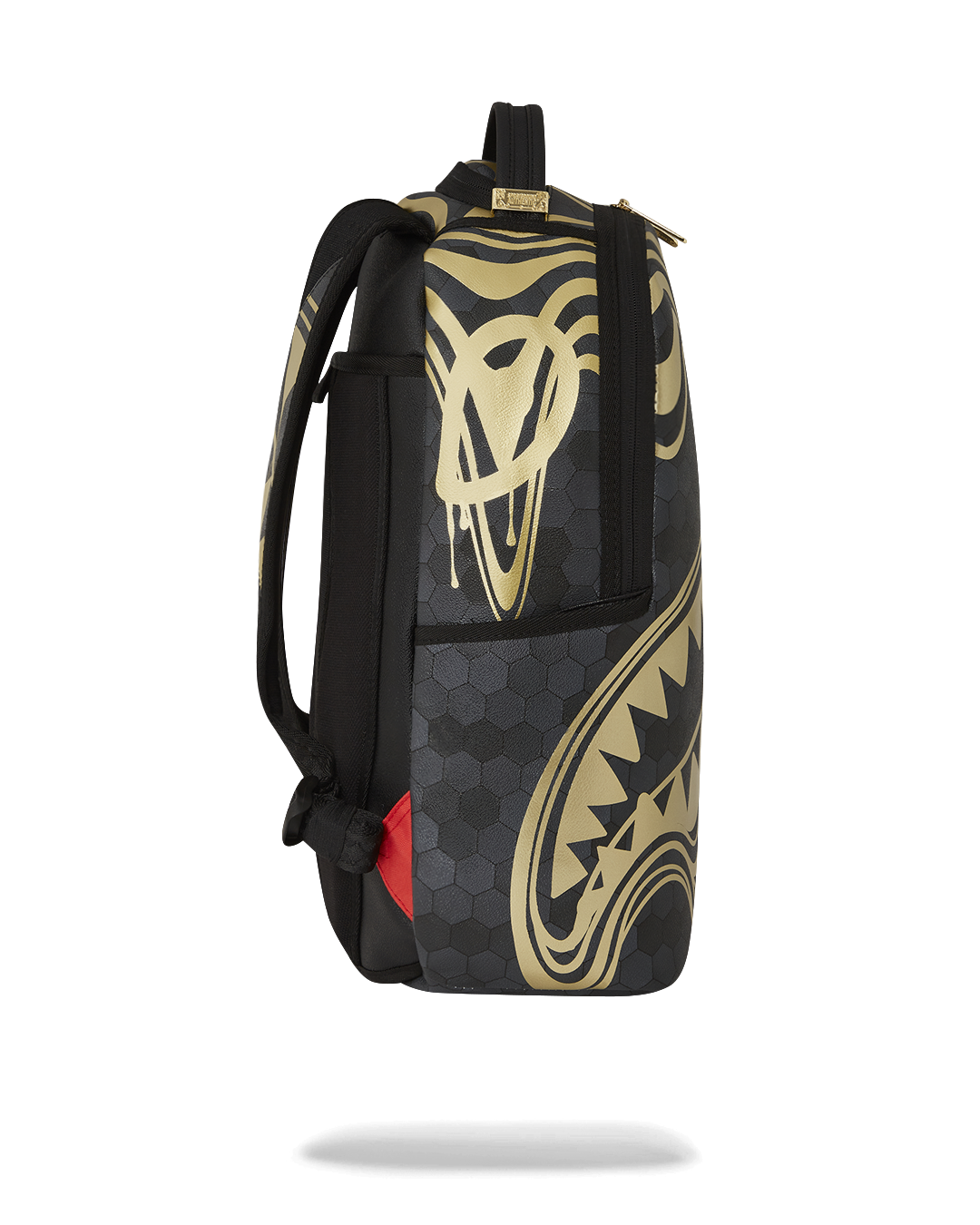 Close-up of the backpack’s ergonomic padding and gold zippers