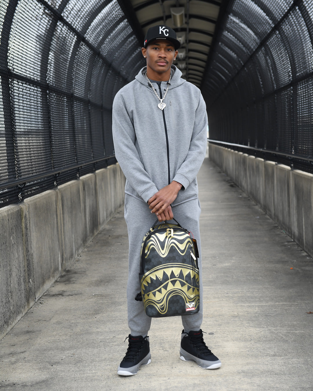 Honeycomb backpack worn by a designer in an urban setting