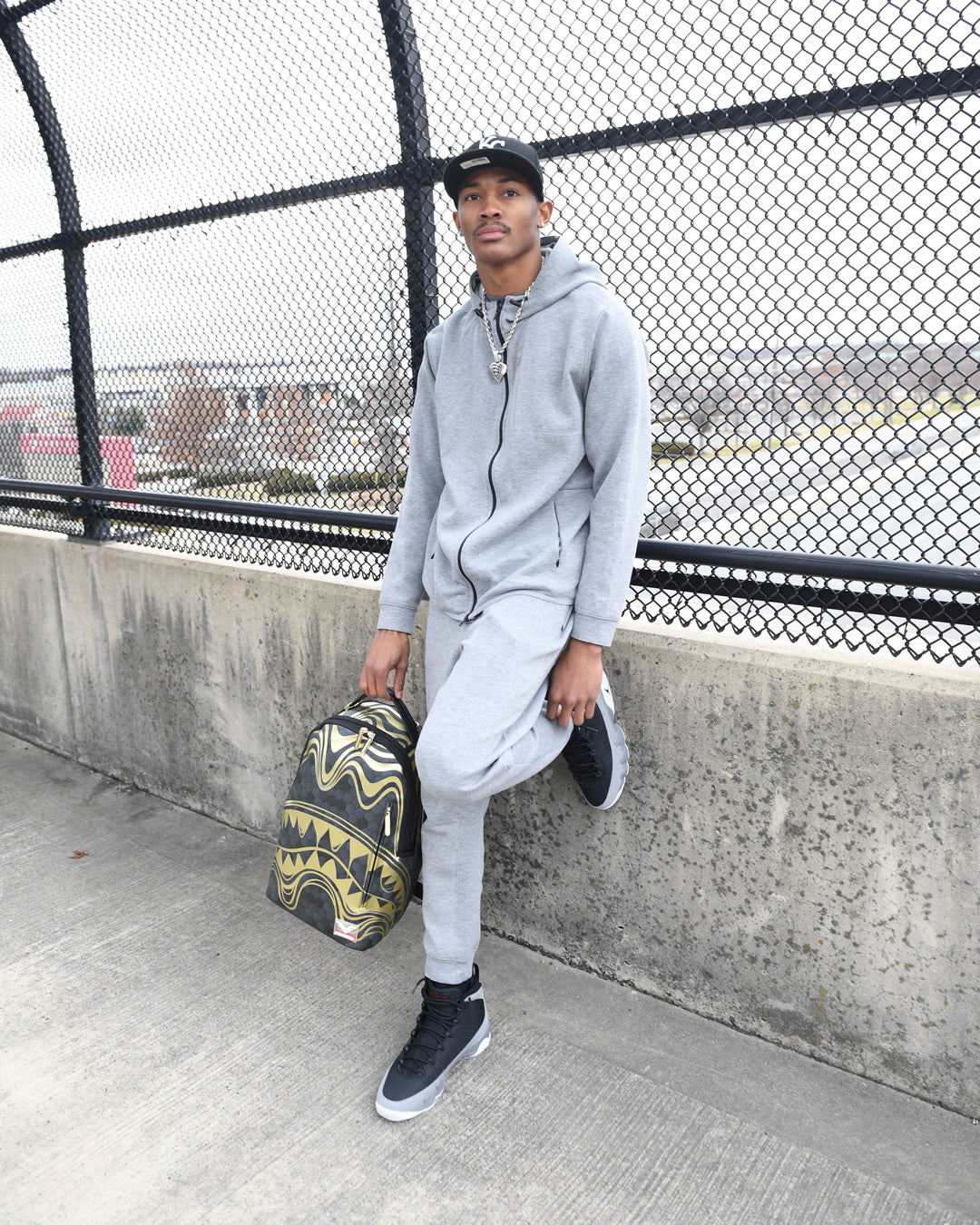 Honeycomb backpack worn by a designer in an urban setting