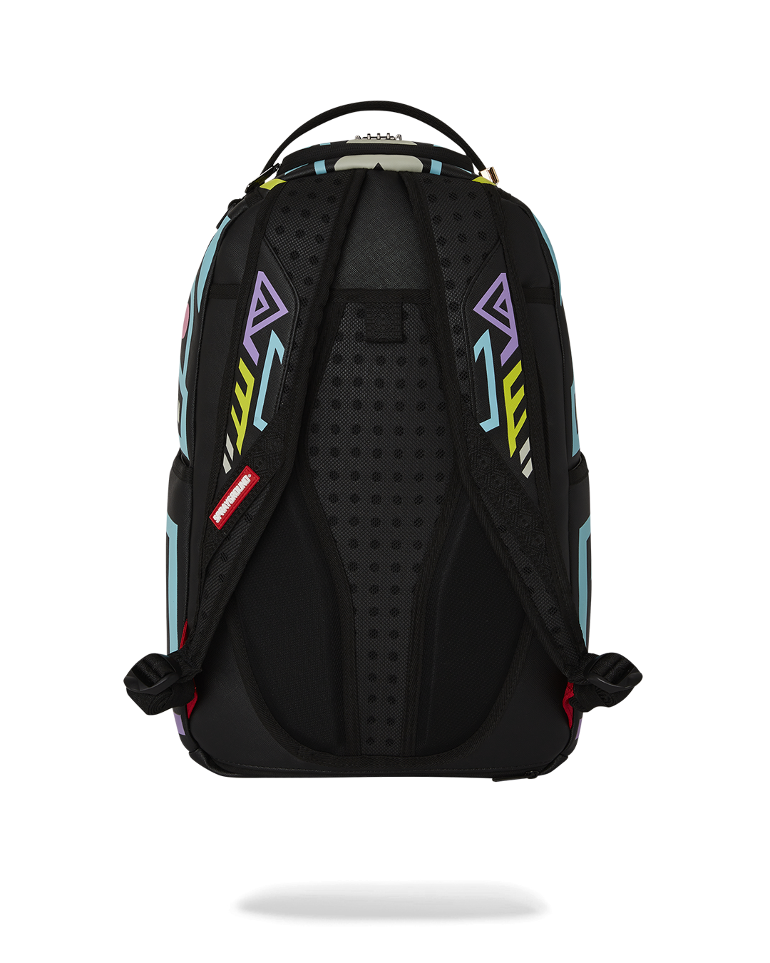 Pink Sprayground backpack with side pockets, attached to rolling luggage