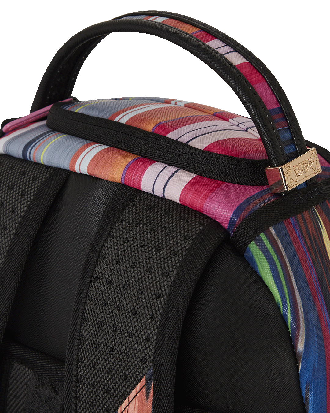 Front view of the Velora backpack showing its gold hardware and ergonomic straps