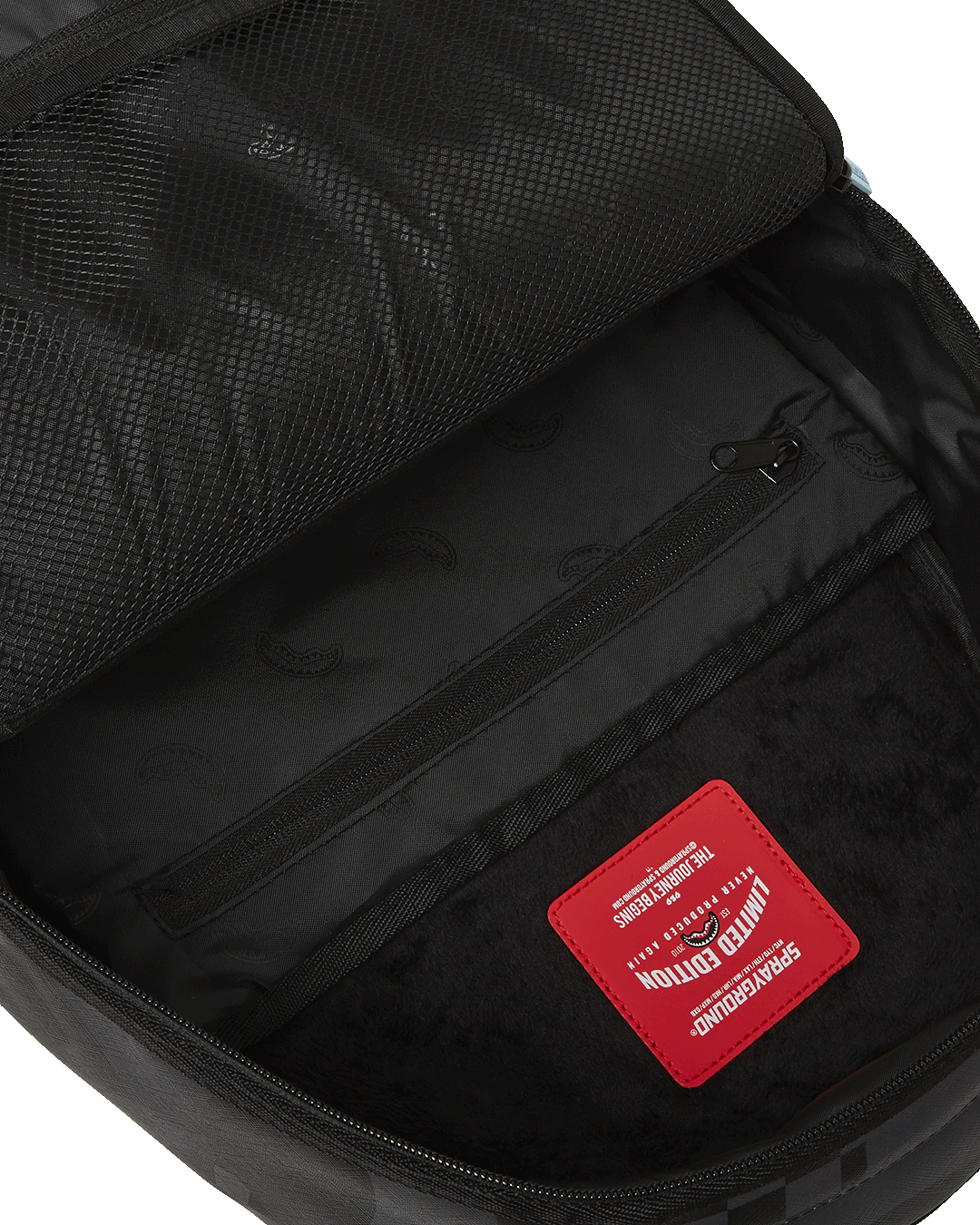 Front view of the Smurfs faux leather backpack with gold zippers and playful design
