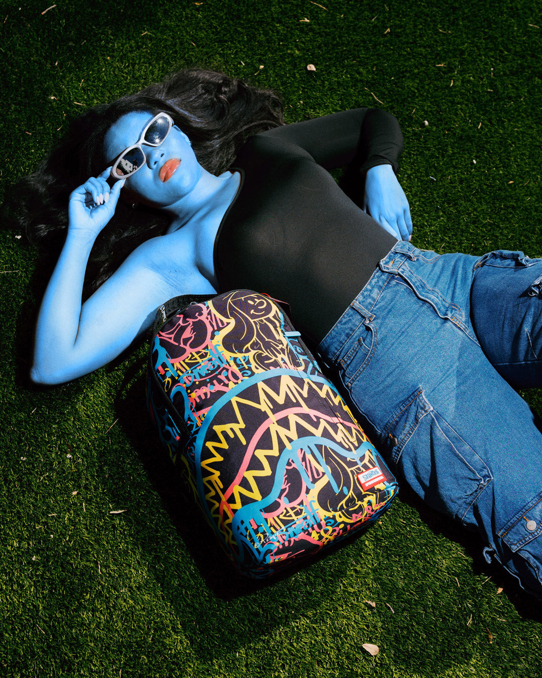 Model wearing limited edition backpack in urban setting
