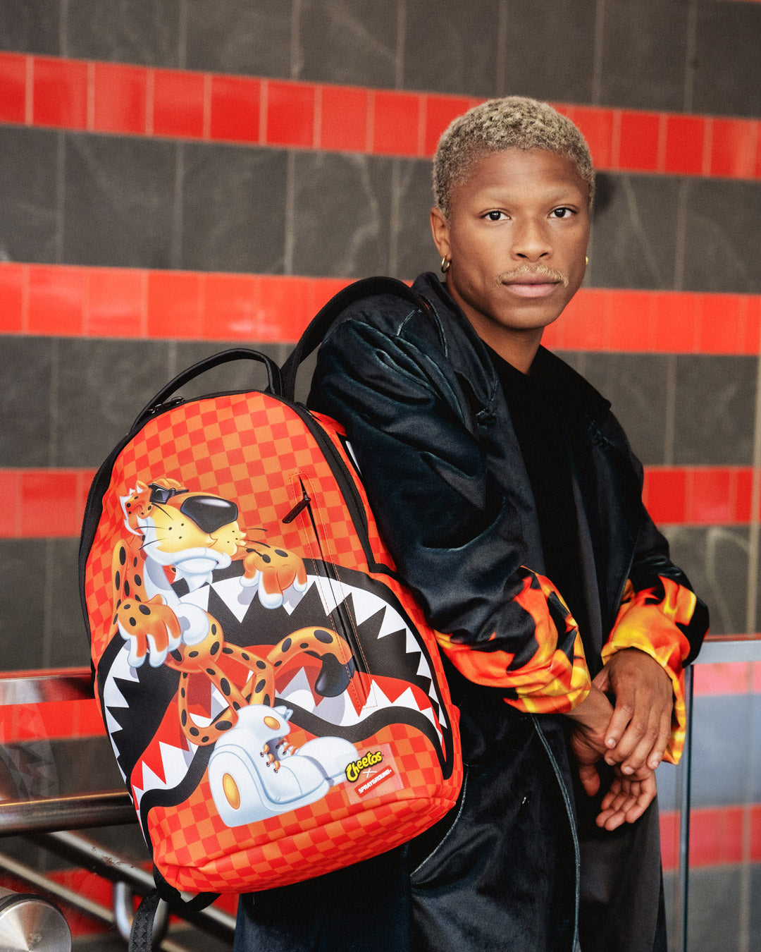 Interior shot of the faux leather backpack with velour laptop sleeve and organizer pockets