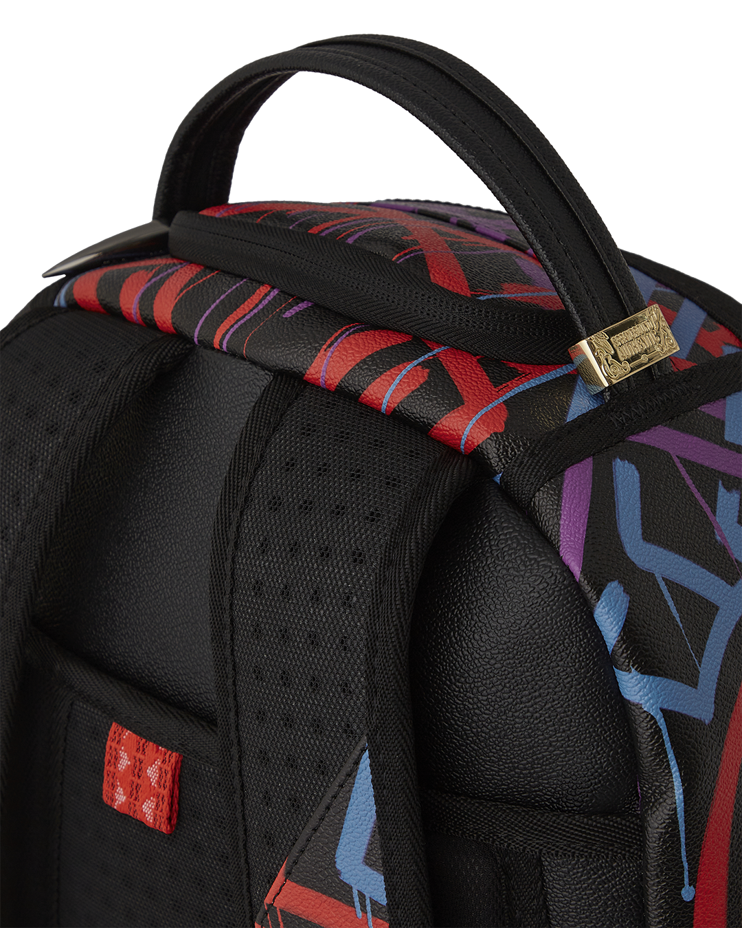 Interior shot showing the velour laptop compartment and mesh organizer pocket