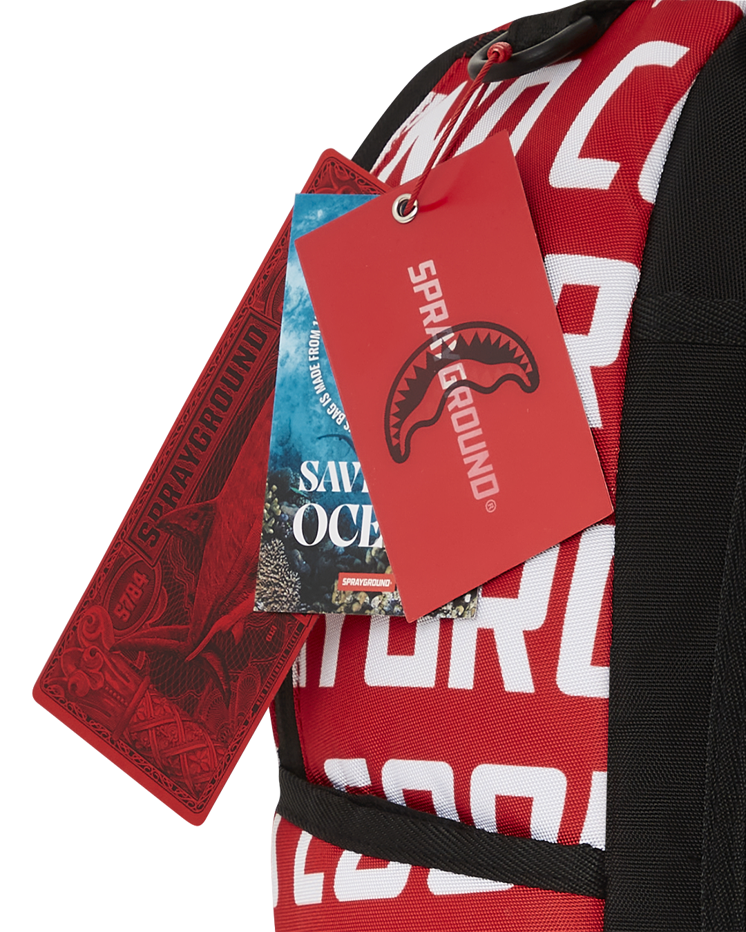 Front view of cookie monster sprayground backpack with zippered pockets and bold design.