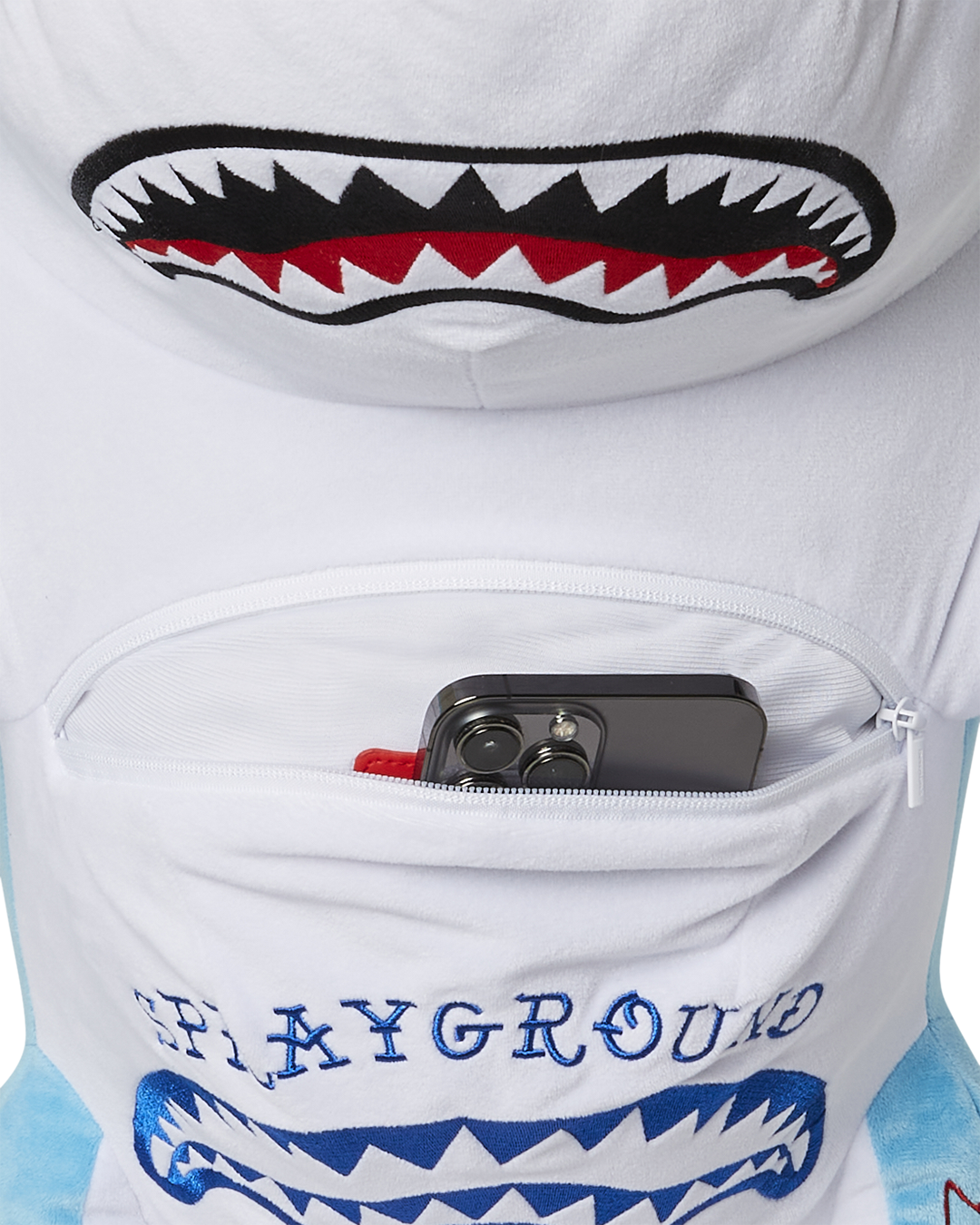 Side view of the shark backpack with adjustable straps for kids.