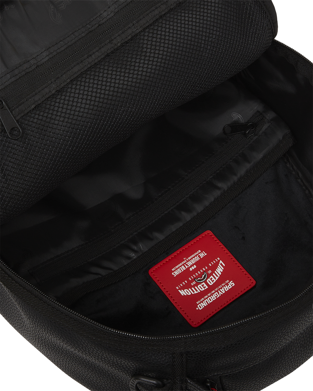Close-up of faux leather texture and gold zipper details on women’s travel backpack