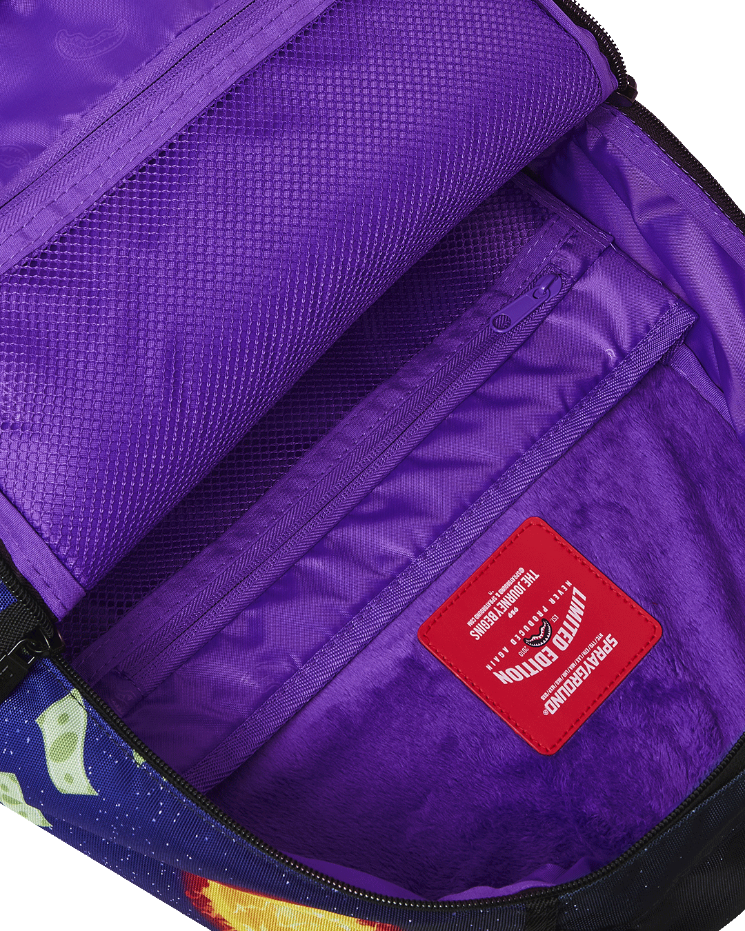 Interior view of the Marvin Deluxe Backpack with laptop compartment.
