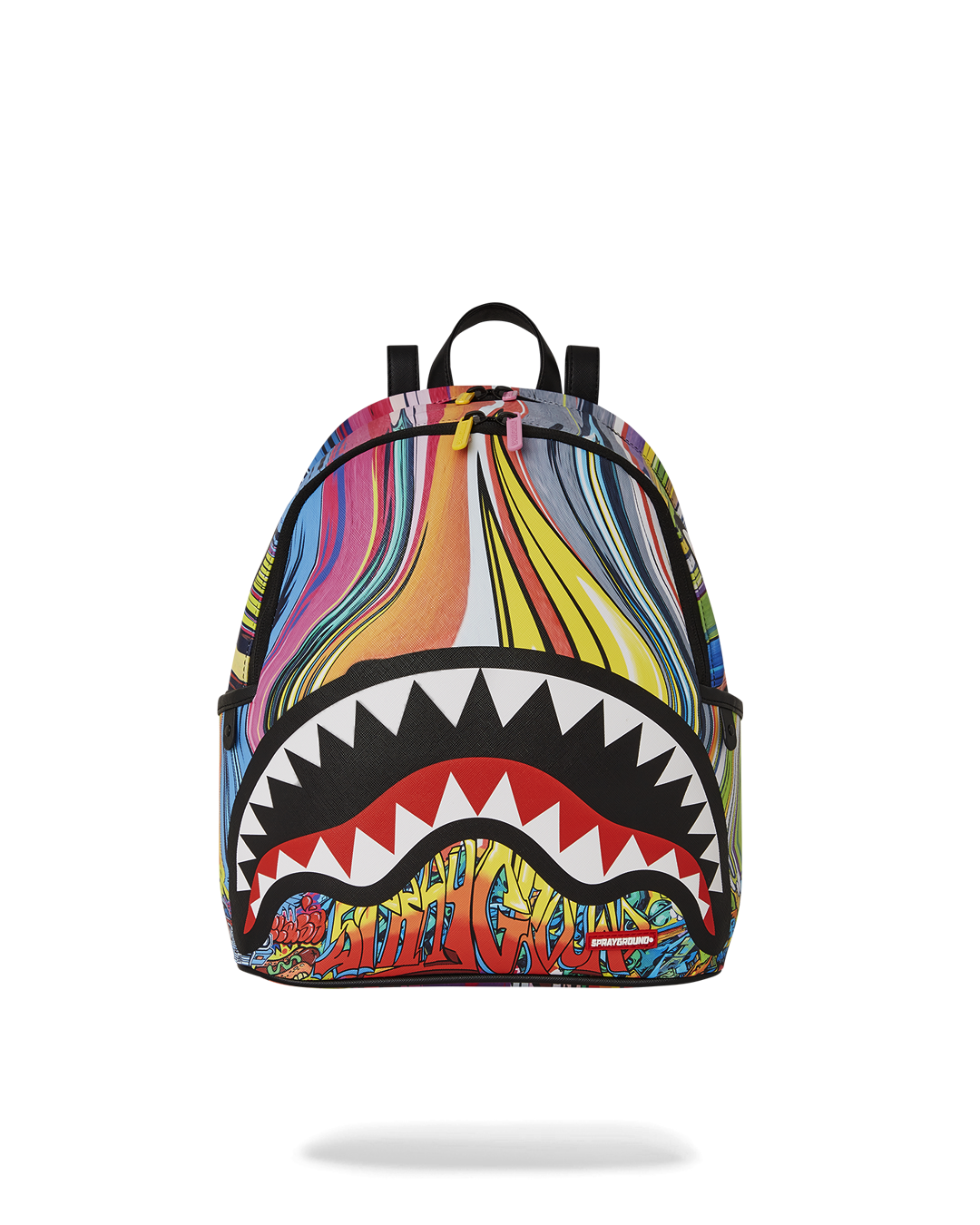 Savage leather backpack displayed on a wooden table with a laptop and notebook