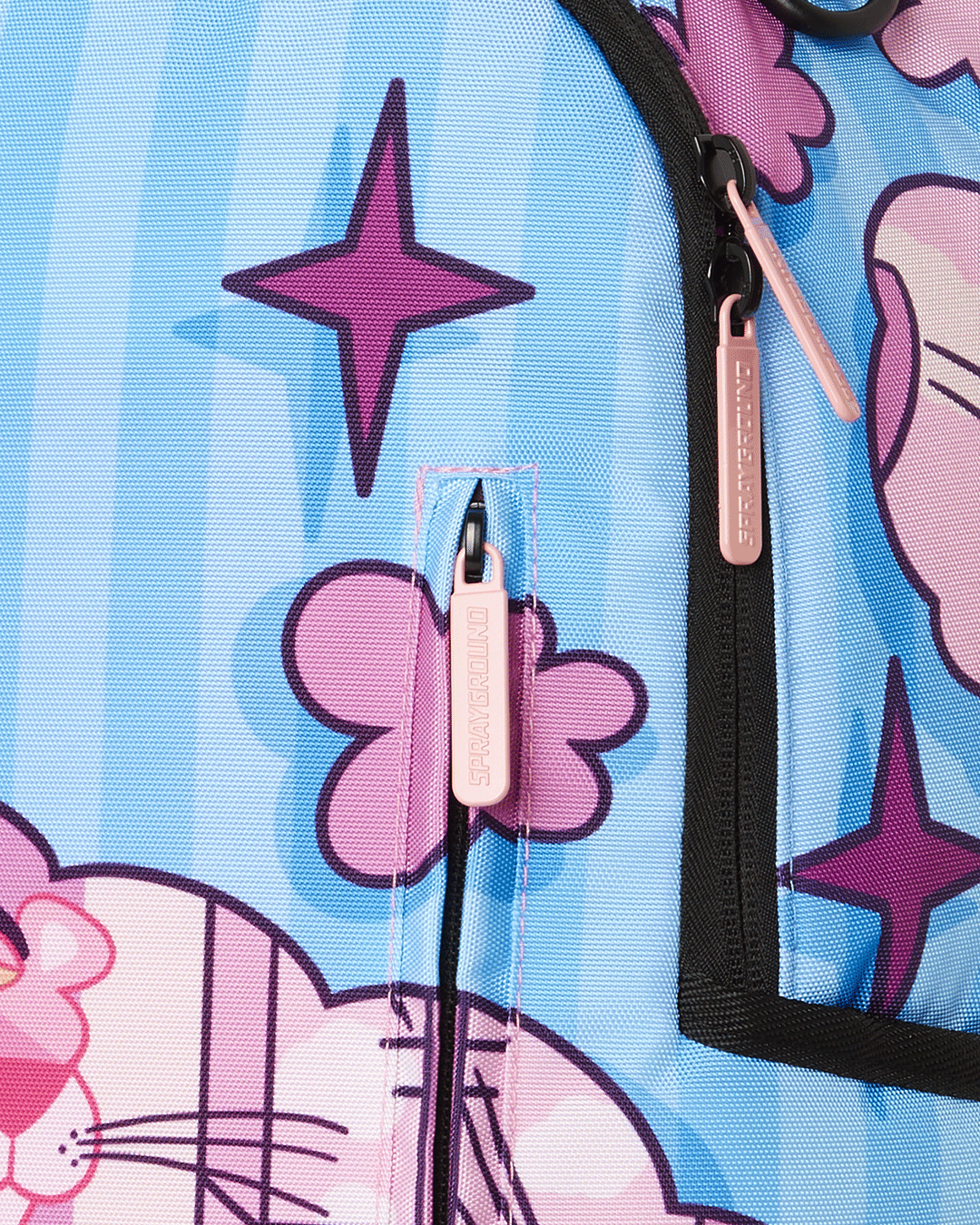 Side view of the pink backpack, highlighting the adjustable straps and organizational pockets.