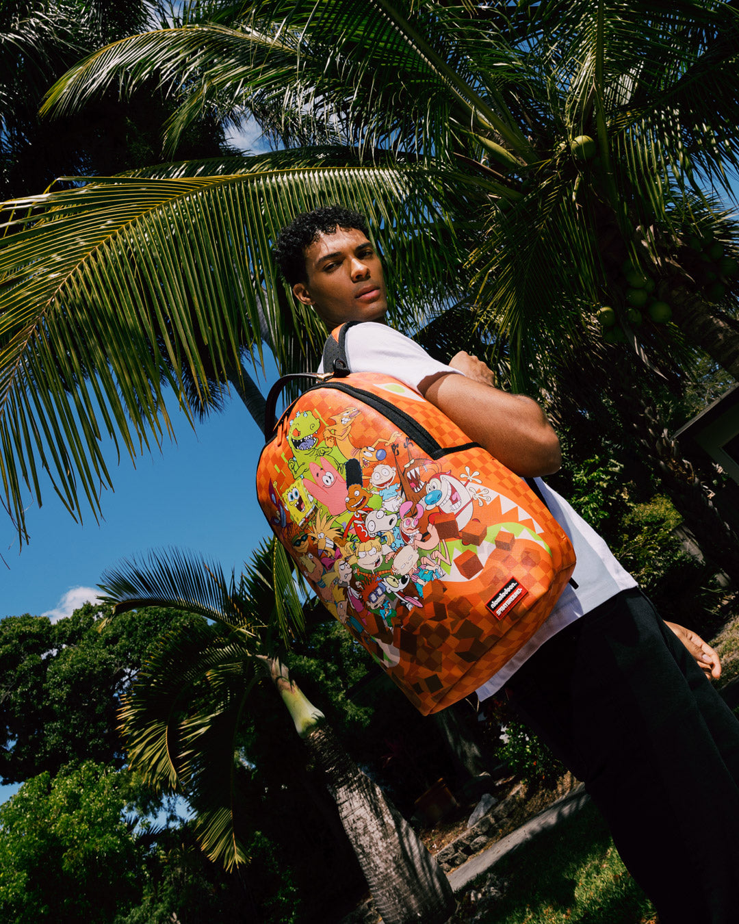 Back view of the laptop backpack featuring mesh padding and carry-on sleeve