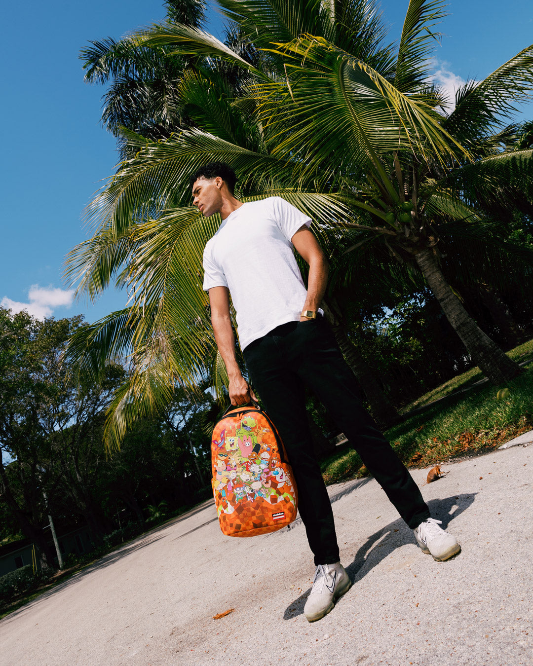 Back view of the laptop backpack featuring mesh padding and carry-on sleeve